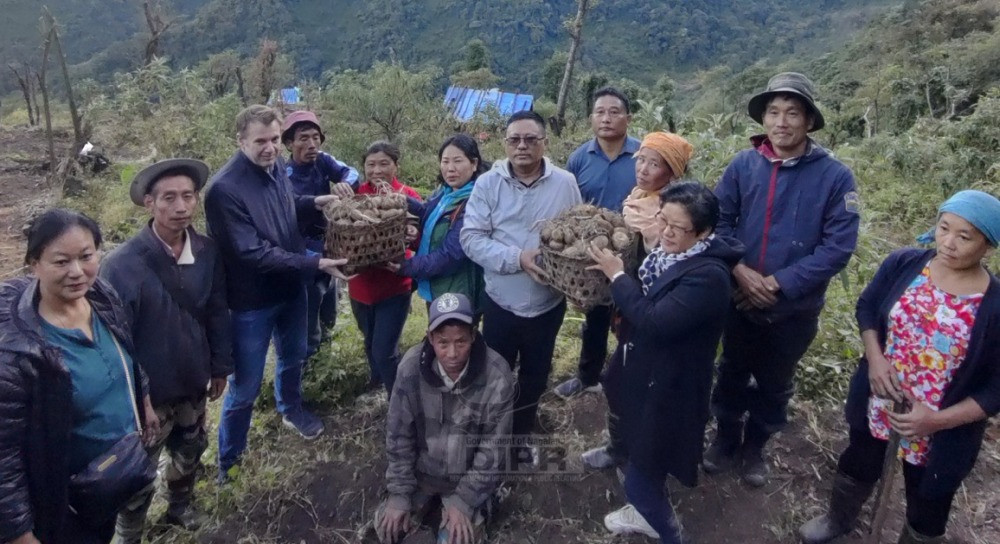 Country Director, IFAD, Han Ulac Demirag, APC and Mission Director FOCUS, Nagaland, Y Kikheto Sema IAS with officials from Agri & Allied department during the visit to project site at Jakhama village on November 19. (DIPR Photo)